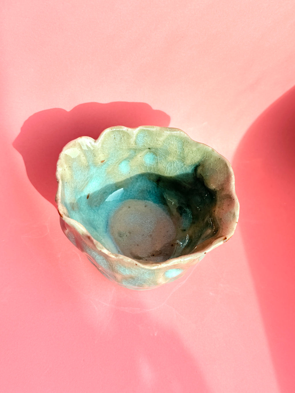 Small celadon green handmade stoneware bowl made by Bunzy
