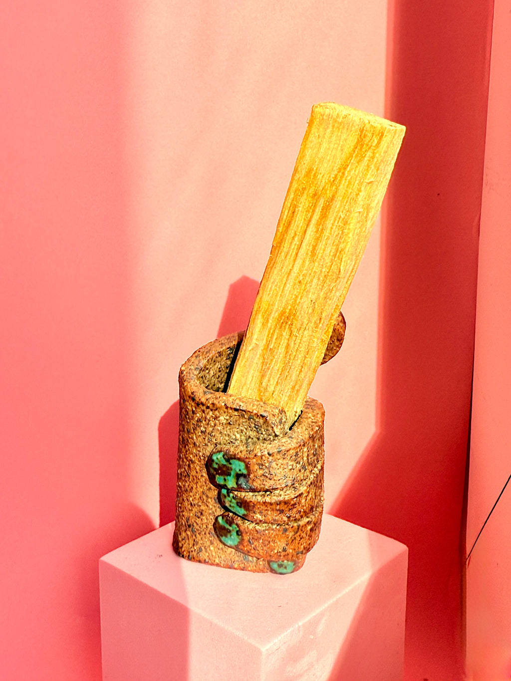 Bunzy handmade ceramic Palo Santo hand holder made from speckled stoneware.