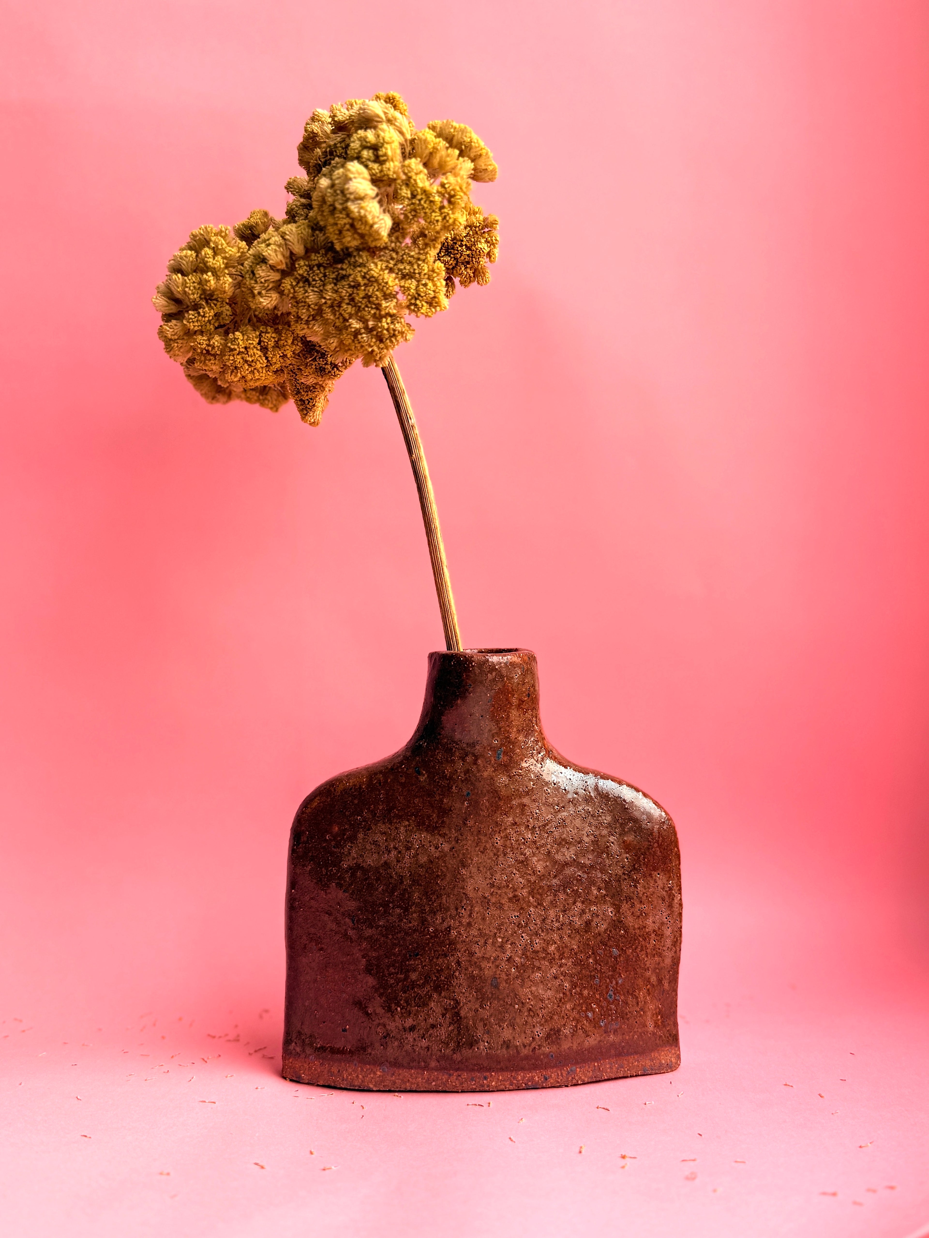 Bun Bun ceramic sculpture with warm copper glaze floating form by Bunzy