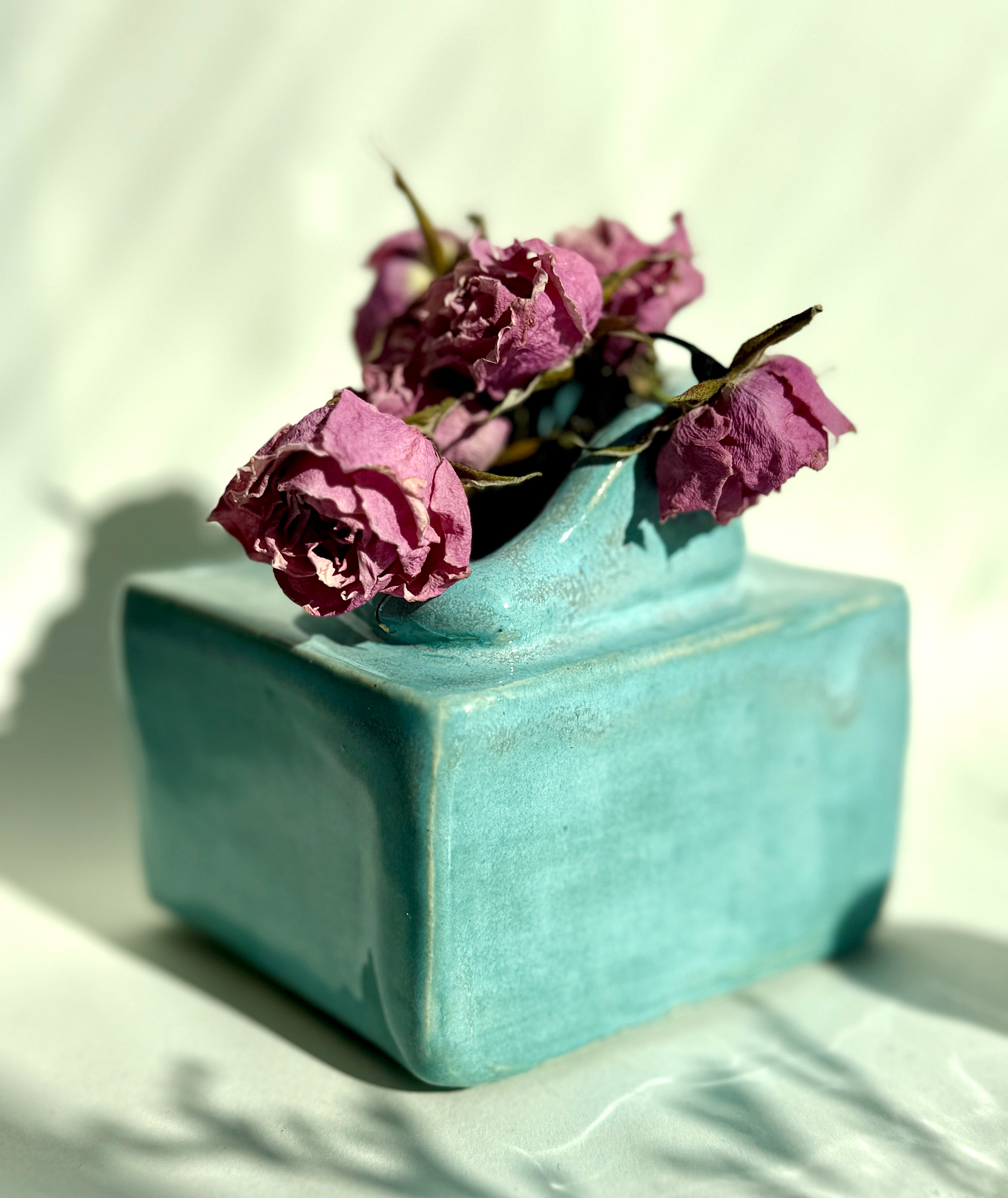 Handbuilt ceramic stoneware vases, match holders, and trinket trays with playful glaze designs, handmade in NYC by Bunzy NYC