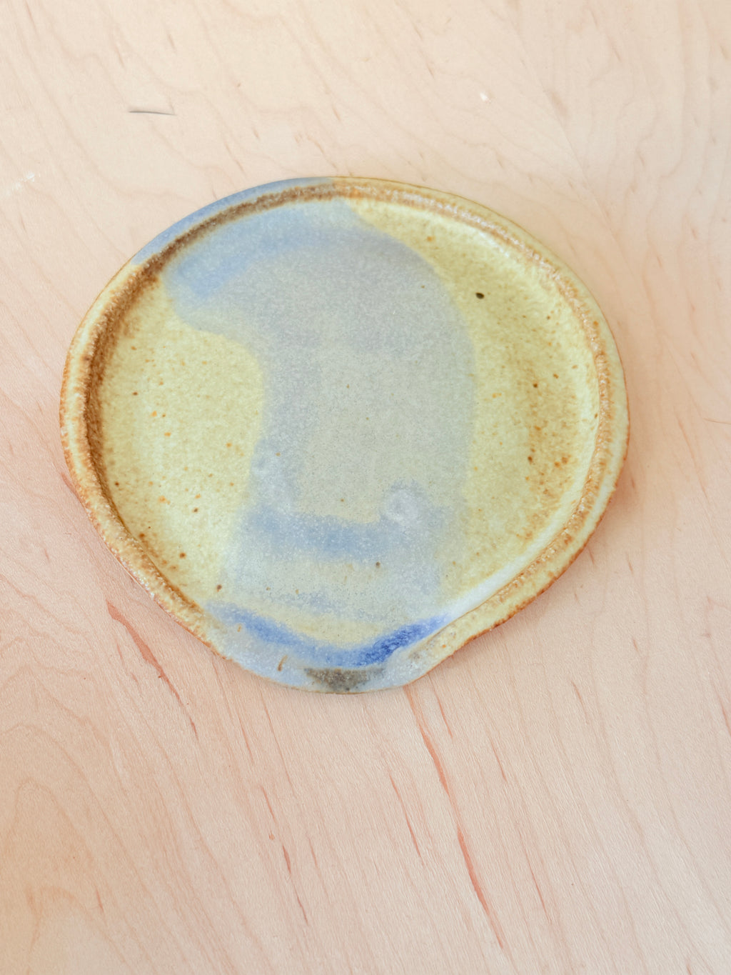 Handbuilt stoneware spoon rest with organic shape and cream and blue glaze, 5.0 oz, by Bunzy Ceramics