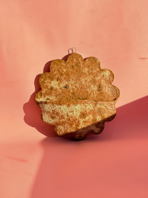 Handbuilt terracotta ceramic wall pocket by Bunzy with scalloped edges