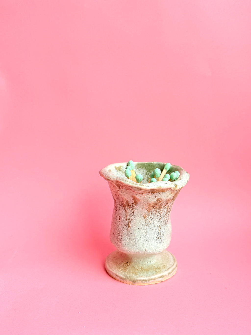 Bunzy mini green ceramic bud or matches holder vase handmade from stoneware with pedestal base.