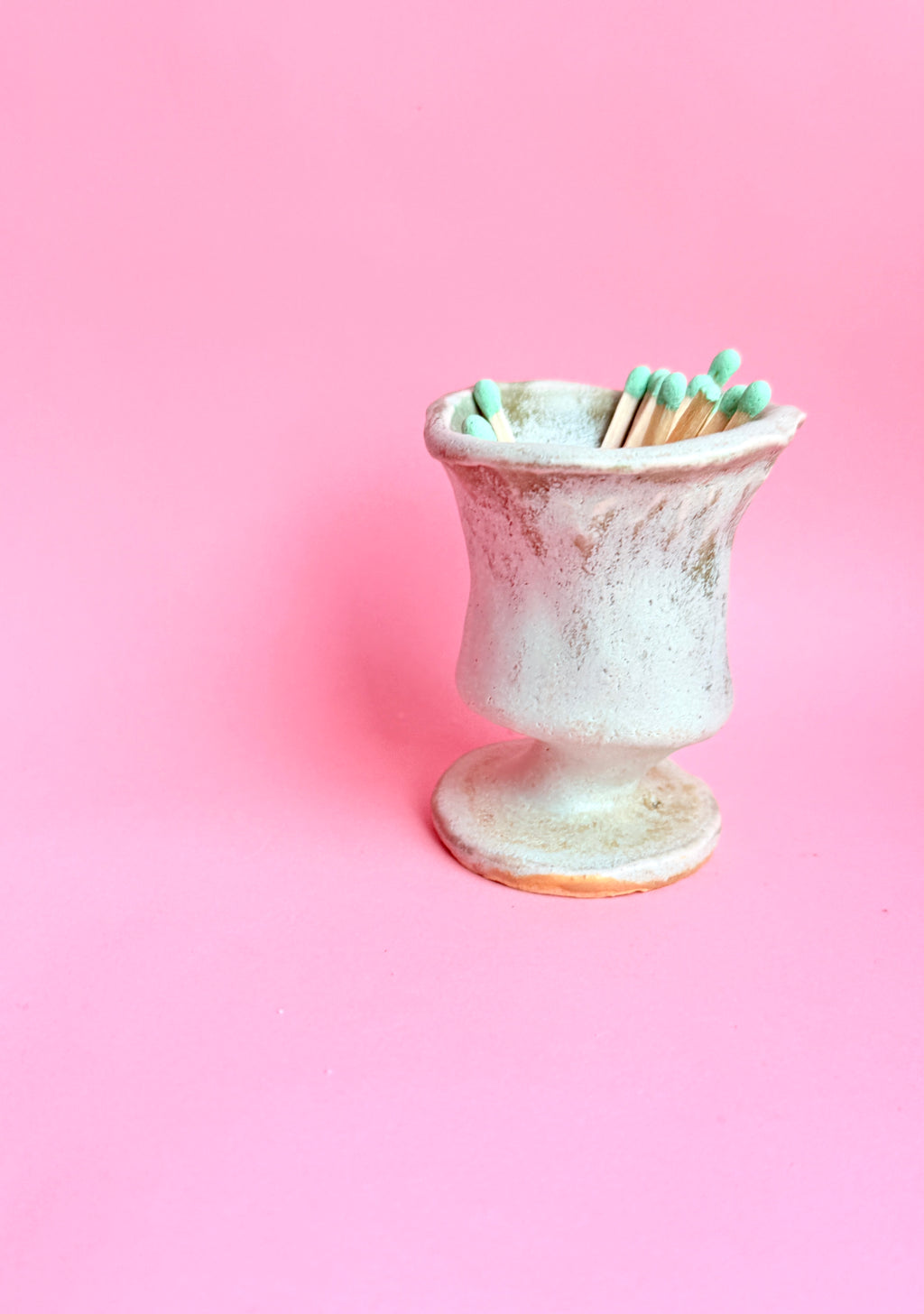 Bunzy mini green ceramic bud or matches holder vase handmade from stoneware with pedestal base.