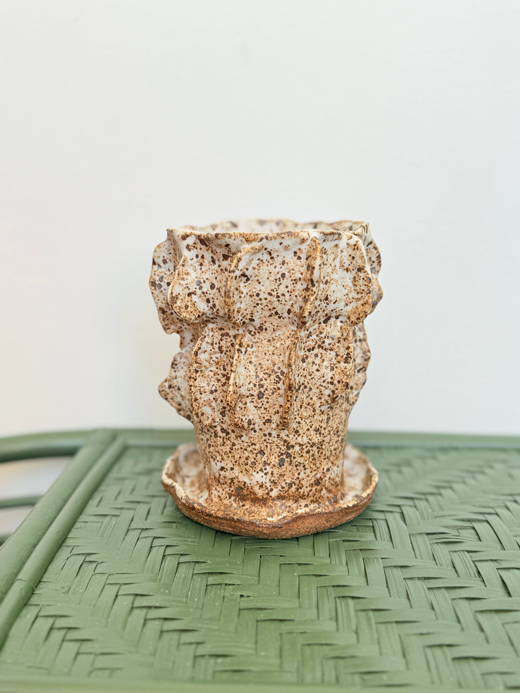 Handmade ceramic vase with organic form and speckled finish
