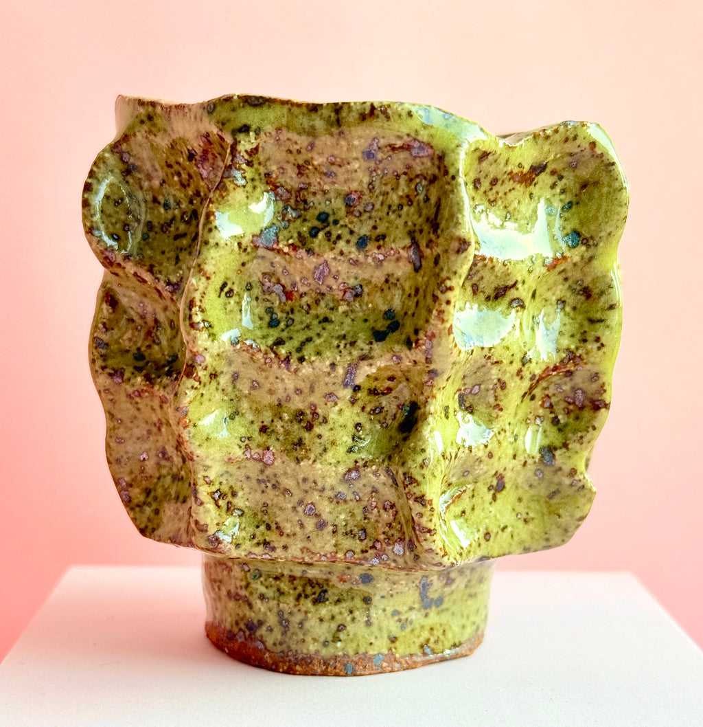 Small green speckled ceramic air plant holder with textured handbuilt form
