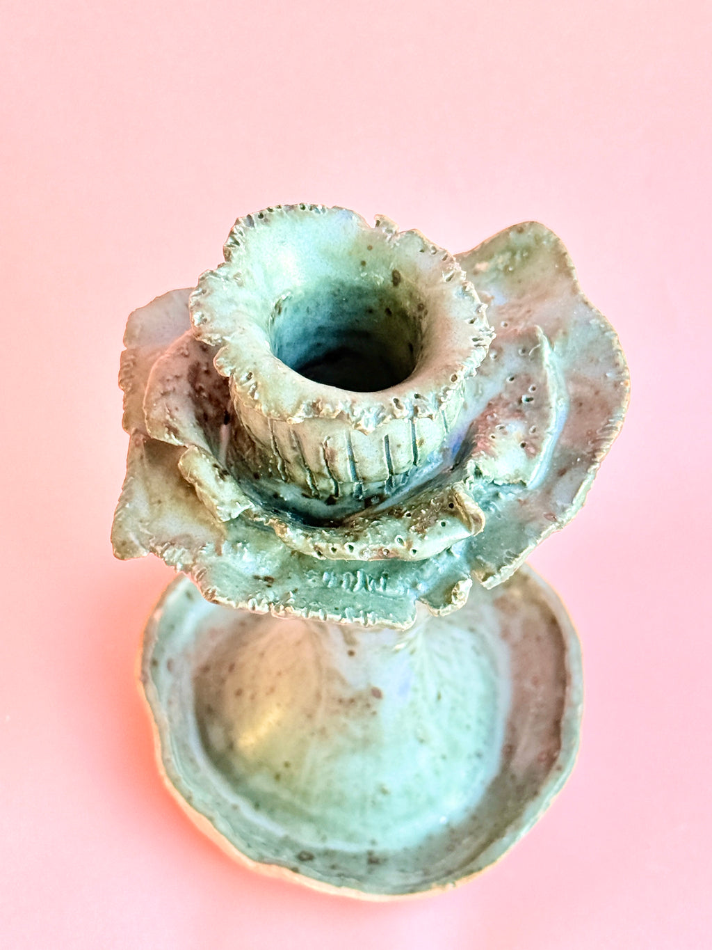 Top view of handbuilt ceramic blue candle holder with organic rim