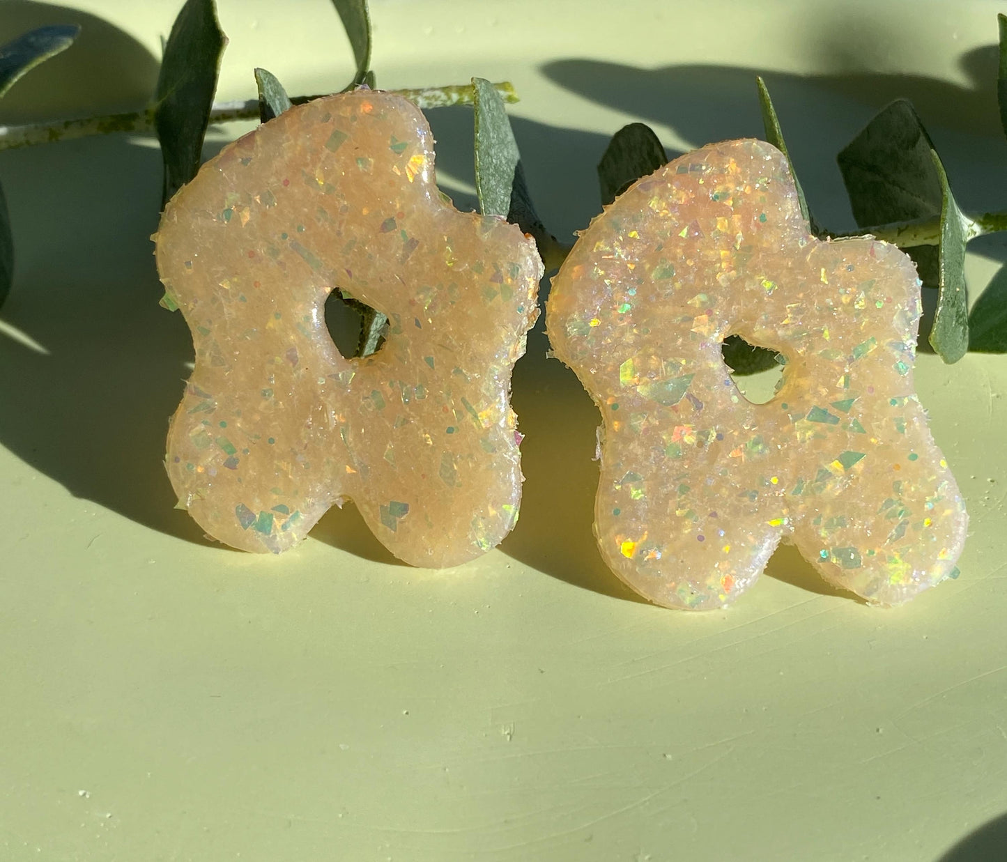 Funky-shaped clear and glitter polymer clay earrings – handmade, lightweight, and perfect for bold statement style.