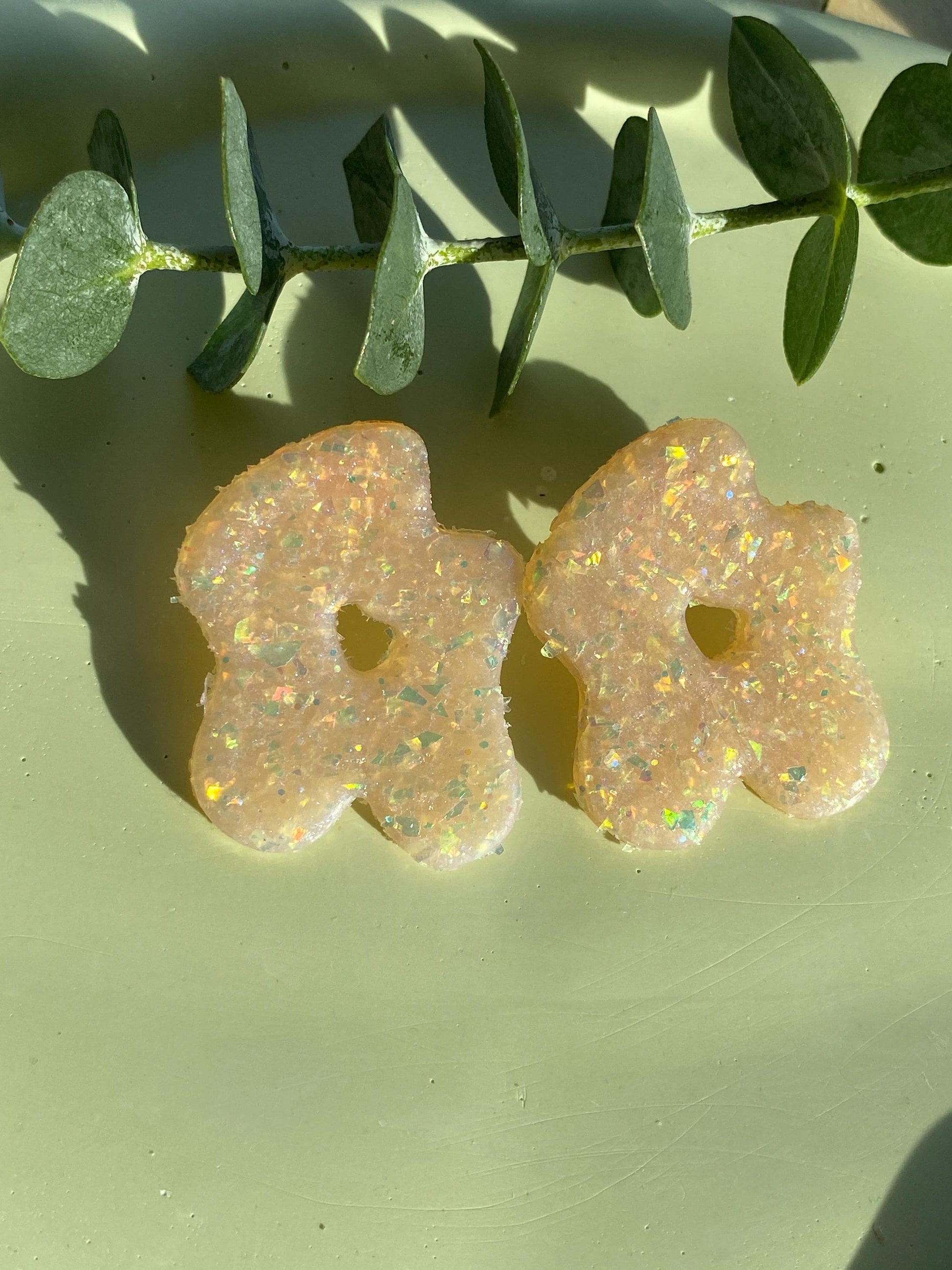 Funky-shaped clear and glitter polymer clay earrings – handmade, lightweight, and perfect for bold statement style.