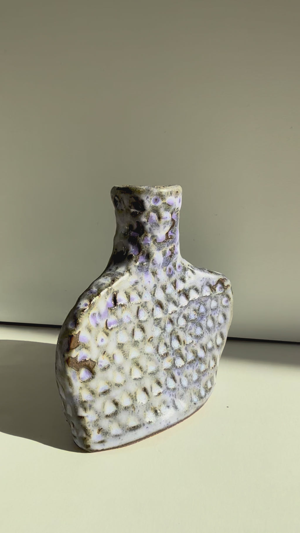 video of close up of purple vase
