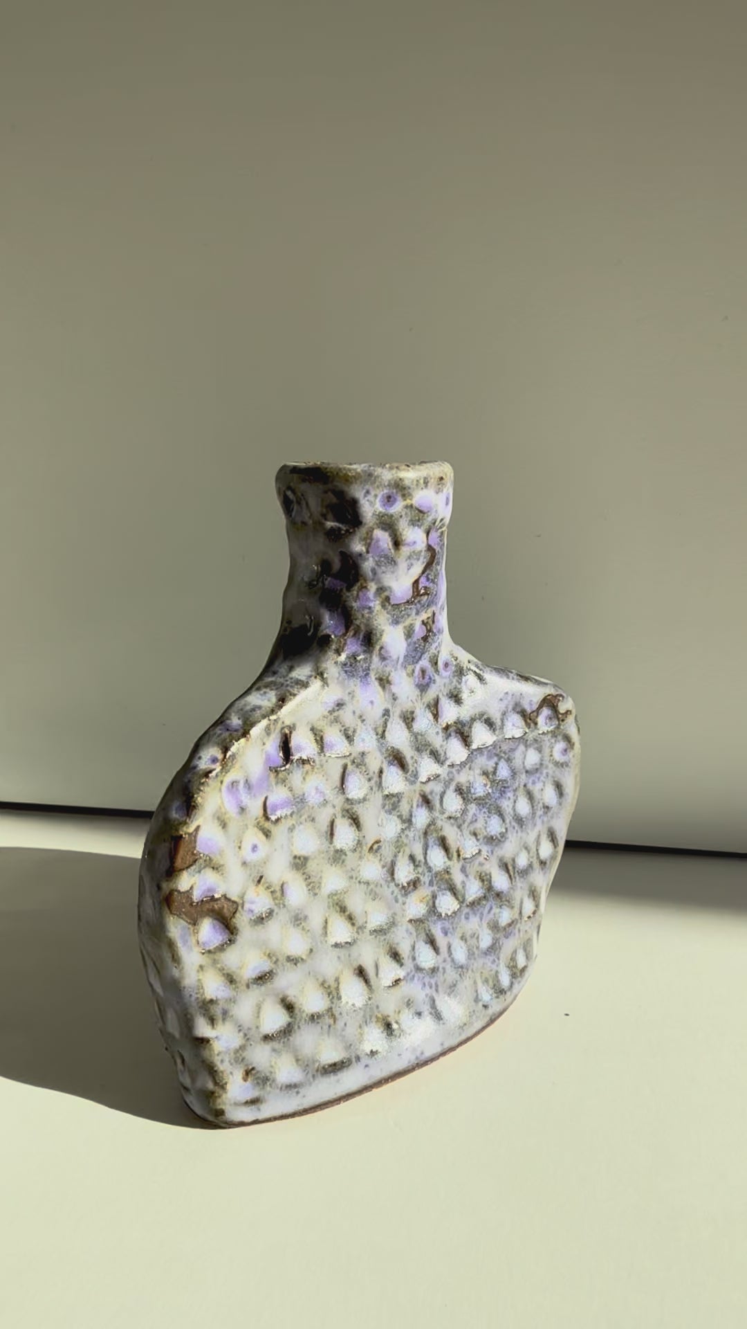 video of close up of purple vase
